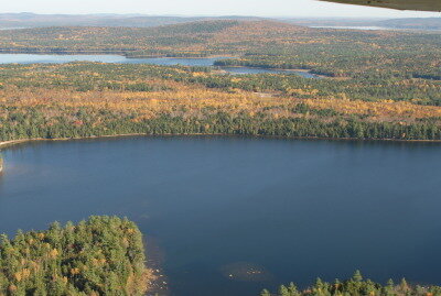 Wabassus and Pocumcus Lakes and Farm Cove Mountain, with West Grand Lake and the West Grand Lake Community Forest Project in the background. Photo courtesy of Downeast Lakes Land Trust / LightHawk